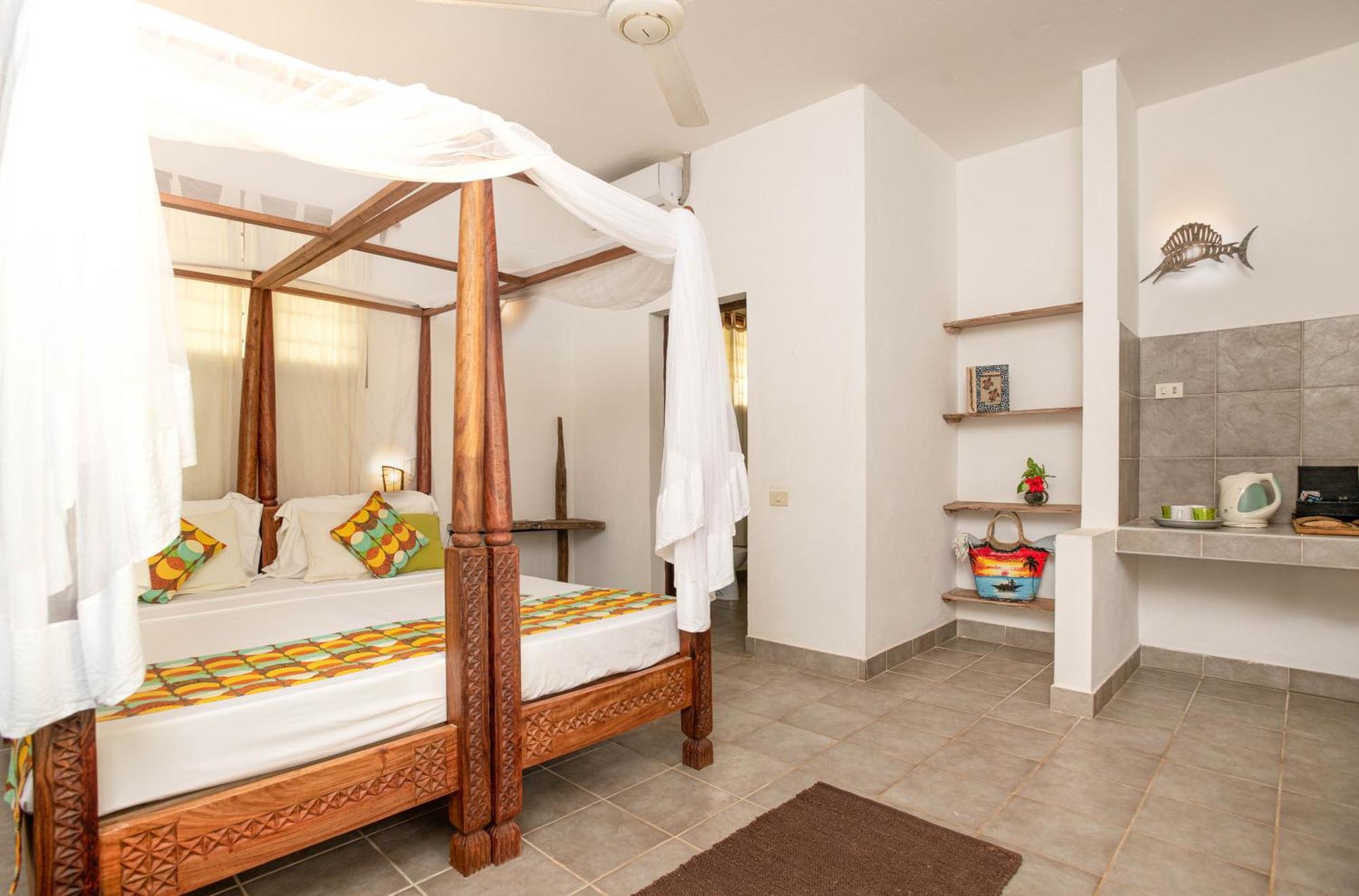 Mvuvi Boutique Resort Кивенгва Номер фото