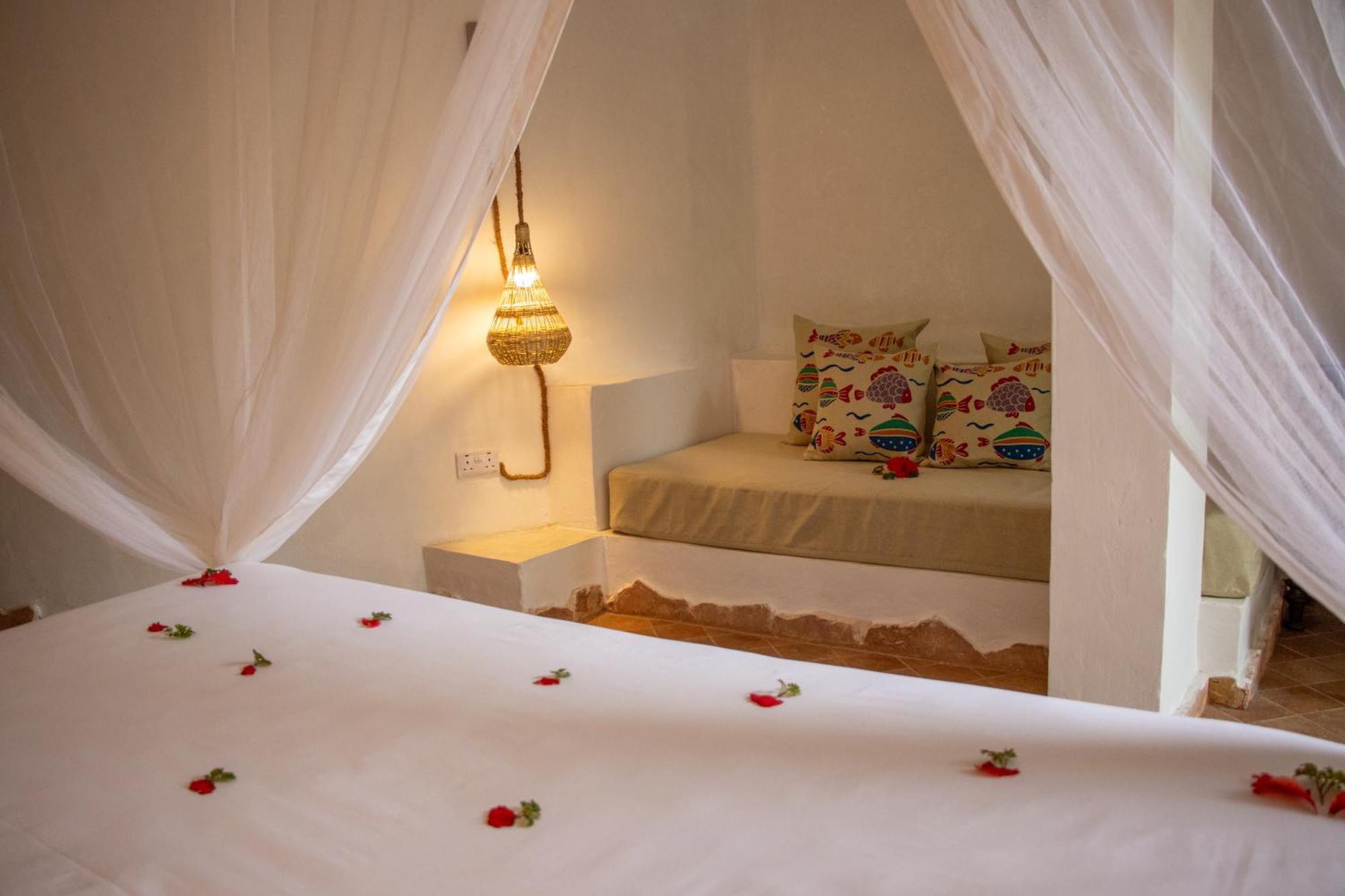 Mvuvi Boutique Resort Кивенгва Номер фото